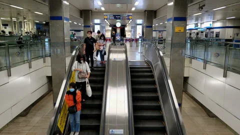 Commuters Wearing Face Masks Because of Coronavirus at Subway Station in Bangkok Stock Footage 130771303