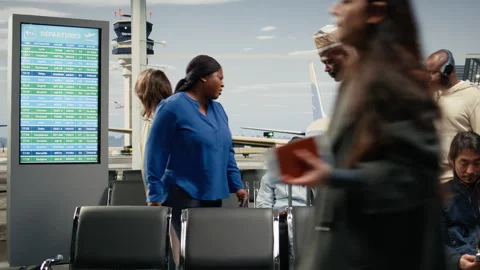 Commuting, delayed flight and upset women in airport transport hub Video stock 333107882