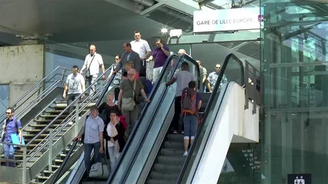 Commuting passengers at Gare de Lille Europe Station. Video stock 146105260