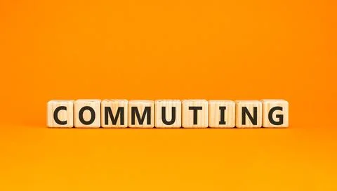Commuting symbol. Concept word Commuting on beautiful wooden blocks. Beauti.. Stock Photos