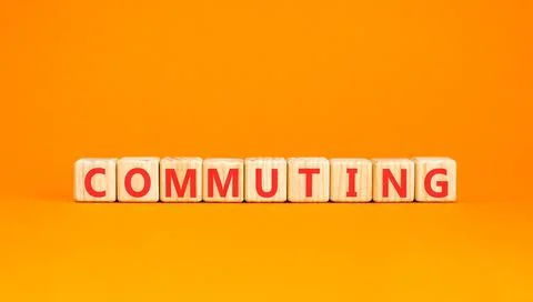 Commuting symbol. Concept word Commuting on beautiful wooden blocks. Beauti.. Stock Photos