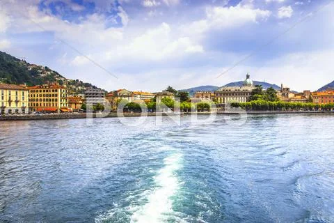 Como city in italian lake district from ferry boat. Italy. Stock Photos