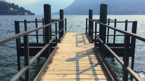 Como lake footbridge walking from camera point of view Stock Footage 118649787