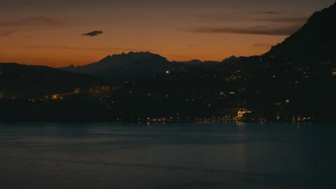 Como lake at night with beatiful sunset and cloudy sky 스톡 동영상 139276416