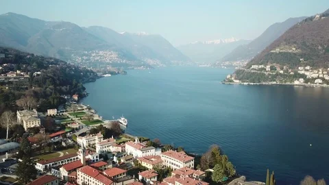 Como lake shot above Como city with 4k drone on sunrise Stock-Footage 87608798