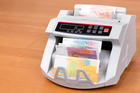 Comorian Franc in a counting machine Stock Photos