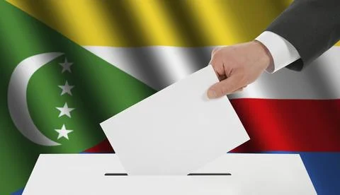The Comoros flag and the hand with the bulletin about the ballot box Stock Illustration