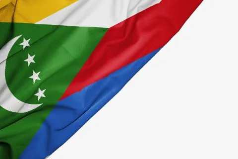 Comoros flag of fabric with copyspace for your text on white background. Stock Illustration