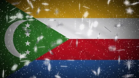 Comoros flag falling snow loopable, New Year and Christmas background, loop Stockbeeldmateriaal 121257518