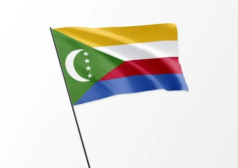 Comoros flag flying high in the isolated background Comoros independence day Stock Illustration