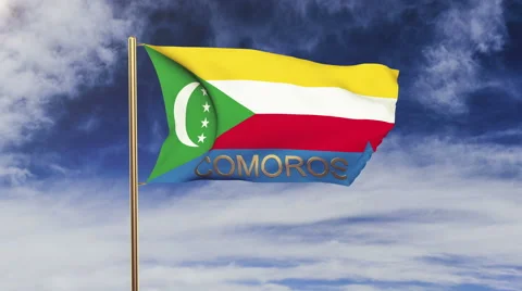 Comoros flag with title waving in the wind. Looping sun rises style.  Animation Stock Footage 48883630