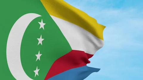 Comoros Flag Waving In Blue Sky Stock Footage 240651155