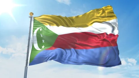 Comoros flag waving in the wind against deep blue sky. National theme. Stock Footage 123982264