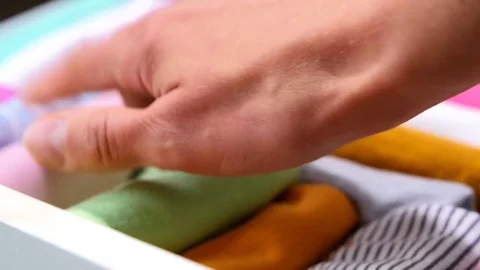 Compact clothes storage Video stock 79708448