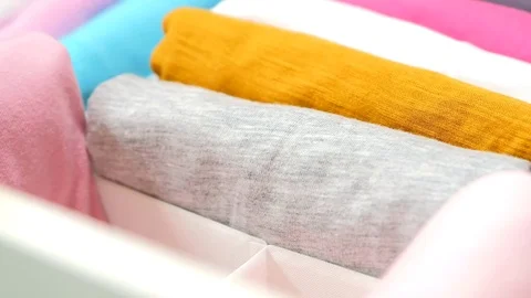 Compact clothes storage Stock Footage 79708452