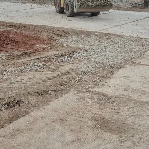 Compact Construction Machine Transporting Bedding Gravel for Foundation - 4K Vídeos de archivo 331602435