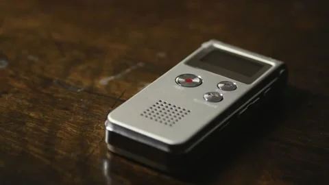 Compact dictaphone, digital recording audio device CLOSE-UP SLIDE shot Stock Footage 304154005