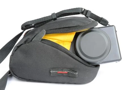 Compact digital camera in bag Stock Photos