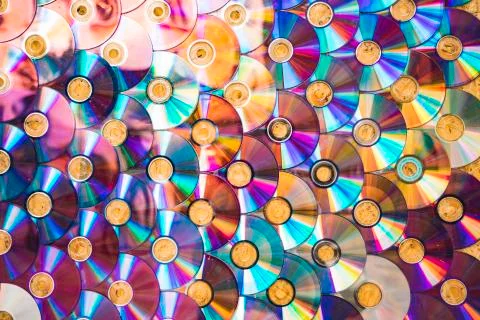 Compact disc background interior wall creative decoration, obsolete technology  Stock Photos