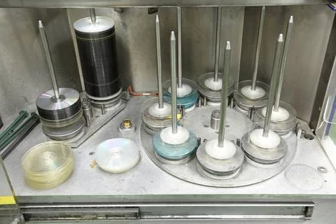 Compact Disc Production Compact disc and DVD at spindles in factory ,prope... Stock Photos