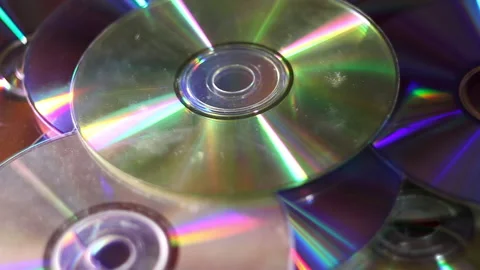 Compact discs falling dawn Video stock 203811879