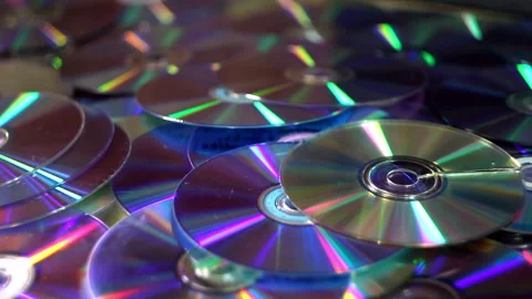 Compact discs falling dawn Video stock 203821672