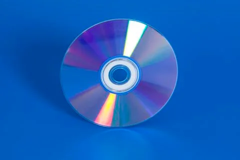 Compact disk on blue background 스톡 사진