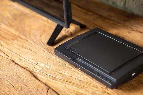 Compact DVD player in the interior on the TV Cabinet Stock Photos