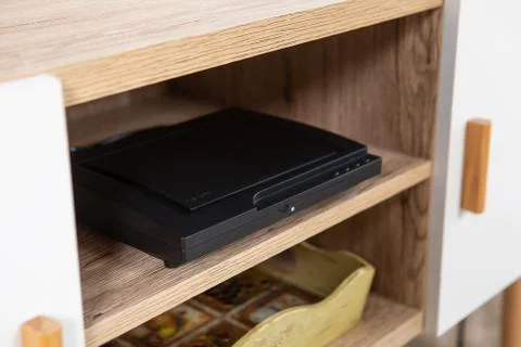 Compact DVD player in the interior on the TV Cabinet Stock Photos