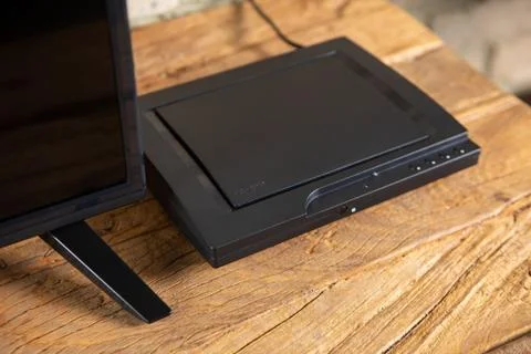 Compact DVD player in the interior on the TV Cabinet Stock Photos