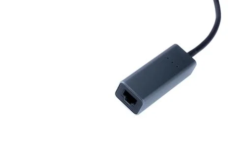 Compact Ethernet Adapter.  Connects to USB for easy internet access. Sleek .. Stock Photos