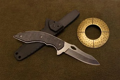 Compact knife with a fixed blade. Stock Photos