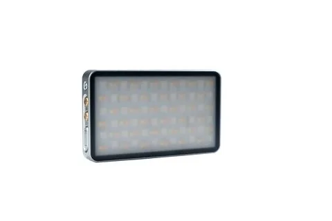 Compact LED video light panel with diffuser and side controls, isolated on white Foto stock