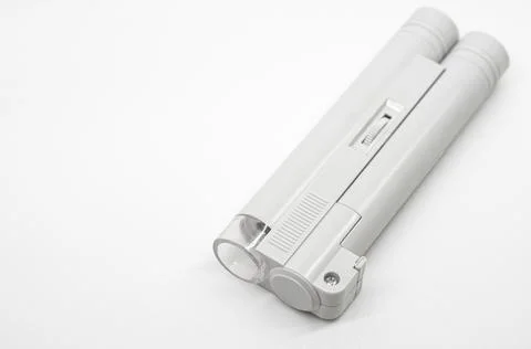 Compact mini microscope for printing and design. Magnifying device. Selective Stock Photos