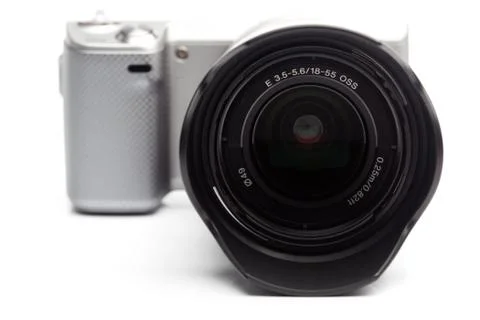 Compact mirrorless system camera with lens Stock Photos