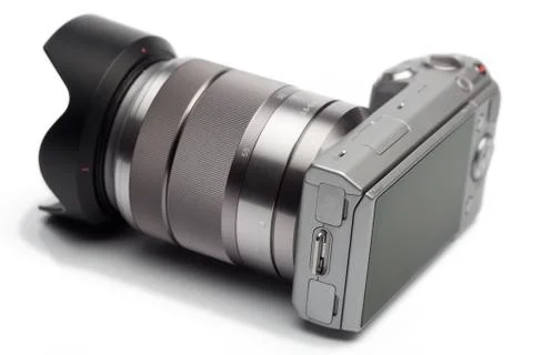 Compact mirrorless system camera with lens Stockfoto's