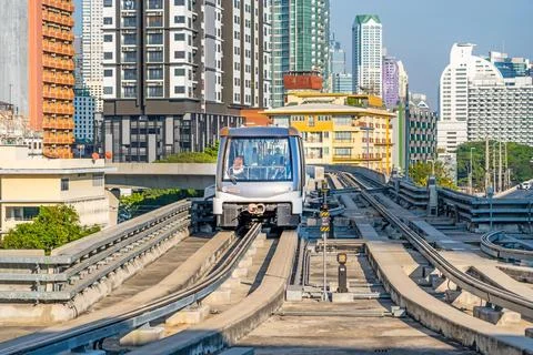 Compact monorail express route through urban developments Stock Photos