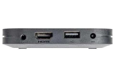 Compact multimedia device back panel with audio HDMI USB power ports Stock Photos