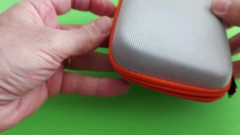 Compact Orange Travel Mini Case with Mesh Pocket Review Stock Footage 308300793