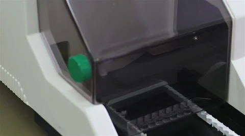 Compact programmable 8-channel washer aspirator for manufactured Microplate Stock Footage 60739388