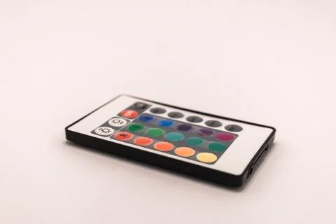 A compact remote control for LED lights, featuring an array of colorful butto Stock Photos