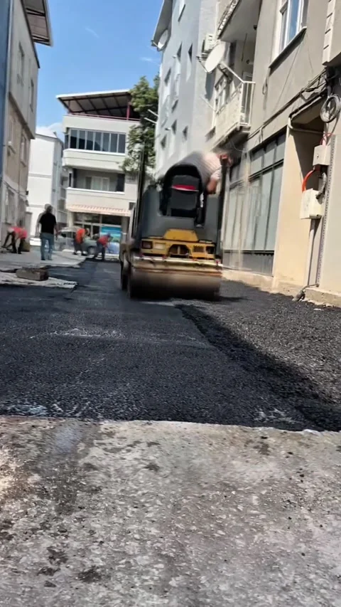 Compact Road Roller Compacting Fresh Asphalt Patch Stock Footage 323654863