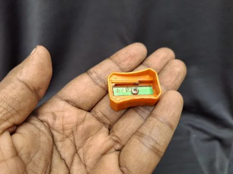 Compact single-hole pencil sharpener Stock Photos