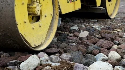 Compact the soil using a road roller Video stock 275535665