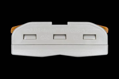 Compact splicing connector isolated on black background. 스톡 사진