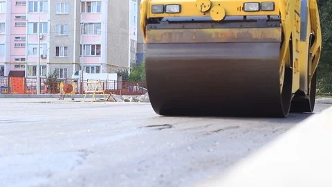 Compact steamroller flatten out the asphalt. Stock Footage 113542761