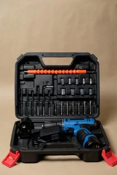 Compact tool case with electric screwdriver and home repair accessories Stock Photos