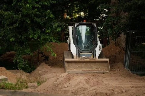 Compact tracked loader. Stock Photos