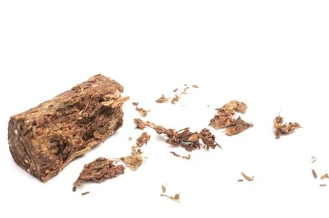 Compacted dried marijuana isolated over white background. 库存照片