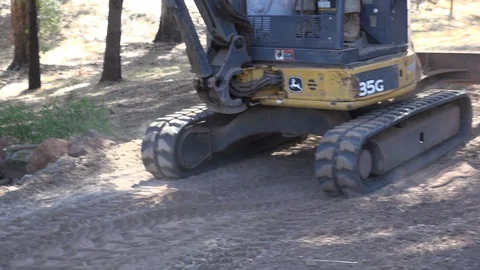 Compacting dirt with front end loader cu HD Stock Footage 123621404